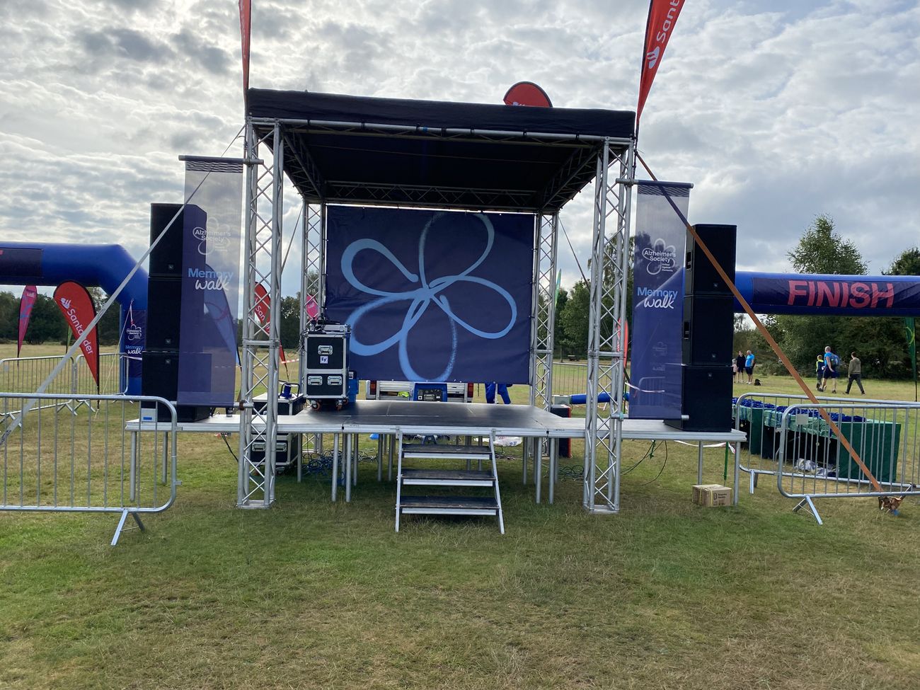 Alzheimer's Society Memory Walk stage with Santander branding